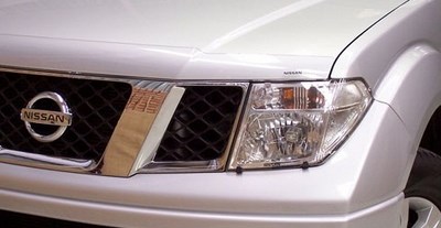 Защита передних фар (прозрачная) Nissan Pathfinder (2005-2010)