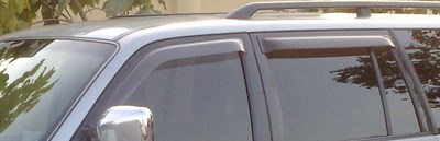 Дефлекторы боковых окон тёмные (4 шт.) Mitsubishi Pajero Sport (2000-2008)