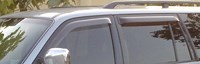 Дефлекторы боковых окон тёмные (4 шт.) Mitsubishi (митсубиси) Pajero (паджеро) Sport (2000-2008) 