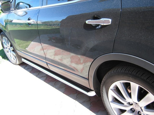 Боковые подножки(пороги) труба из нержавеющей стали 63мм с заглушкой в виде полушария из нержавеющей стали Mazda CX-9 (2010 по наст.)