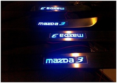        Накладки на пороги с подстветкой на Mazda 3 2003-2009